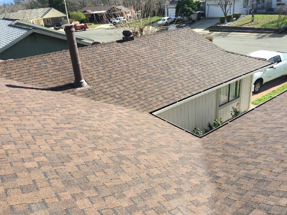 Finished architectural composition shingle roof on a Northern California home